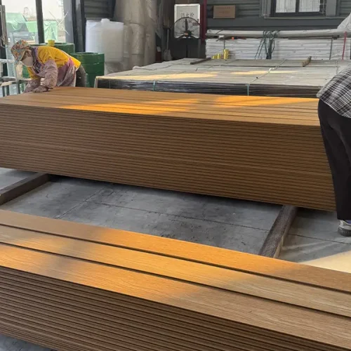 Picture of workers packing plastic wood boards in LEBK factory