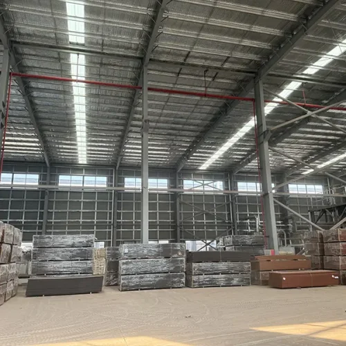 There are many pictures of plastic wood boards piled up in the LEBK factory warehouse